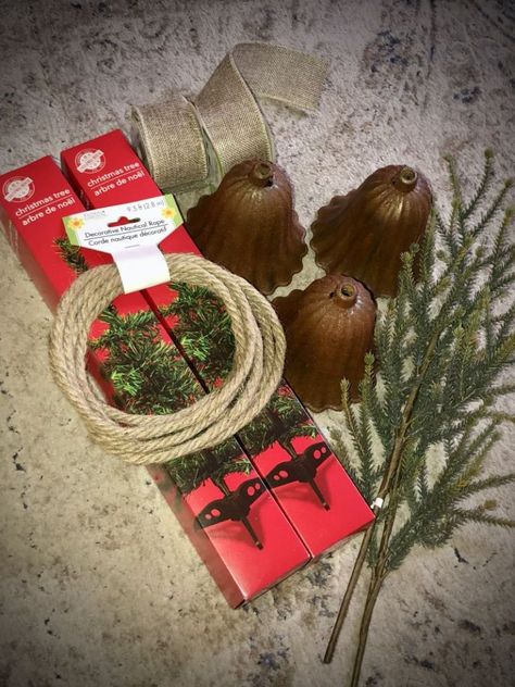 Dollar Tree Christmas Bell Makeover, Christmas Bell Swag Diy, Christmas Swags With Bells, Diy Dollar Tree Christmas Bells, Christmas Bell Centerpiece, Diy Rustic Christmas Bells, Rustic Christmas Outdoor Decor, Rustic Farmhouse Christmas Decor Ideas Diy, Dollar Tree Swag Diy