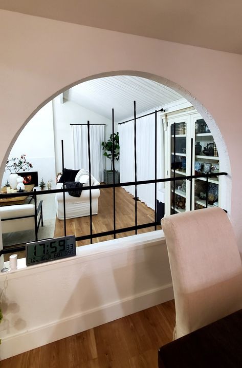 When there is a wall between the living room and dining room, you open a half-circle window to add view and flow....Love this window! Half Glazed Internal Wall, Arc Opening Wall, Arched Pass Through Kitchen To Living Room, Half Wall Glass Partition, Wall Opening Between Rooms, Semi Circle Window, Half Circle Window, See Threw, Circle Window