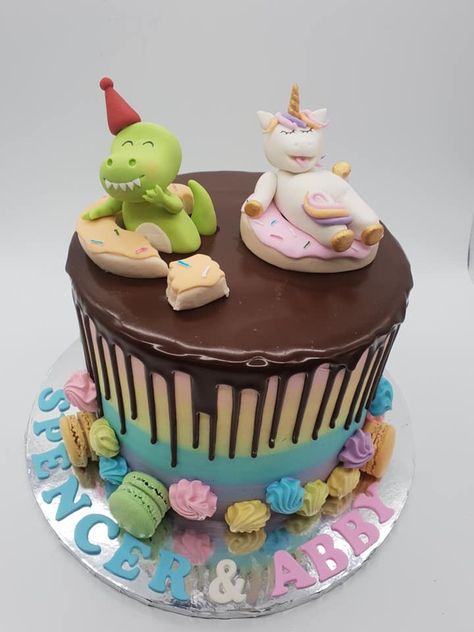 Half Unicorn Half Dinosaur Cake, Dino Unicorn Party, Unicorns And Dinosaurs Birthday Party, Rainbow Dinosaur Birthday Cake, Dinosaur And Unicorn Cake, Unicorn And Dragon Cake, Dinosaur Unicorn Cake, Unicorn Dinosaur Cake, Dinosaur And Unicorn Birthday Party