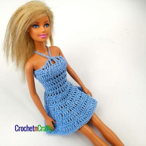 Free crochet pattern for a mini or long crochet barbie dress. You can make this any length that you like for the 11.5 inch Barbie. #crochet #barbie #fashiondoll #crochetbarbiedress #crochetdolldress #crochetpattern #freecrochetpattern #crochetncrafts #rhelena Barbie Dress Crochet, Crochet Barbie Dress, Barbie Crochet Gown, Crochet Barbie Patterns, Crochet Halter Top Pattern, Dress Crochet Pattern, Crochet Doll Clothes Patterns, Barbie Doll Patterns, Barbie Dress Pattern