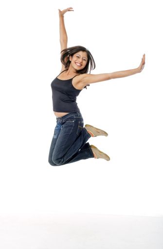 Young woman jumping with excitement Jumping Model Poses, Dynamic Jumping Pose Reference, Jumping Reference, Someone Jumping, Jump Photography, Jump Pose, Happy Poses, Happy Pose, Woman Jumping