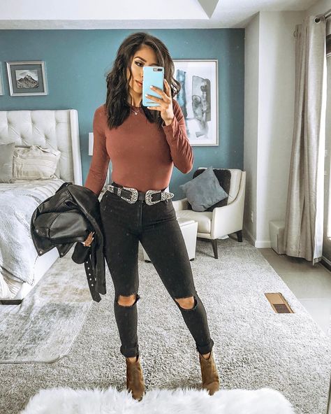 Yvetteg23 on Instagram: romper outfit casual style street style neutral outfit, plum purple mock neck bodysuit top, black high waisted jeans, double buckle belt, tank top casual style outfit brown tan taupe ankle booties outfit  #ootd #outfit #casual #casualstyle #fall #spring #summer #style #romper #freepeople Taupe Booties Outfit, Turtleneck Bodysuit Outfit, Tan Booties Outfit, Outfits With Black Booties, Western Booties Outfit, Brown Bodysuit Outfit, Western Belts Outfit, Romper Outfit Casual, Fall Bodysuit Outfit