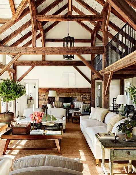 Large living space, one room kind of flowing into the next. Exposed beams. Timber Beams, Wooden Beams, Rustic Living, Rustic Living Room, The Ceiling, A Living Room, Barn House, Architectural Digest, House In The Woods