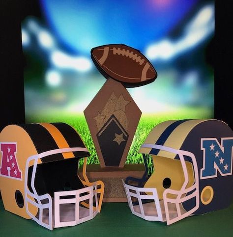 Make a Super Bowl Centerpiece using the 3D Football Helmet SVG file and the Sports Trophy SVG file. Customize to your favorite team. Football Helmet Valentine Box Ideas, Diy Super Bowl Trophy, Diy Football Helmet, Football Helmet Template Free Printable, Football Helmet Template, Football Helmet Svg, Sports Centerpieces, Nfl Football Helmets, Sports Trophies