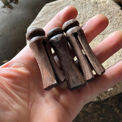 Three clips carved to resemble old clothes pegs but smaller. A perfect addition to your snack or camping stash. Slide one onto any folded bag and keep your chips, crisps, bread, cereal, flour, coffee or anything else stored in a bag nice and fresh between snacks or use. Carved in foraged black walnut. All oiled with a food safe mineral oil and beeswax mixture. Thank you for considering my work. Folded Bag, Chip Clips, Clothes Pegs, Folding Bag, Bag Clips, Old Clothes, Black Walnuts, Black Walnut, Mineral Oil