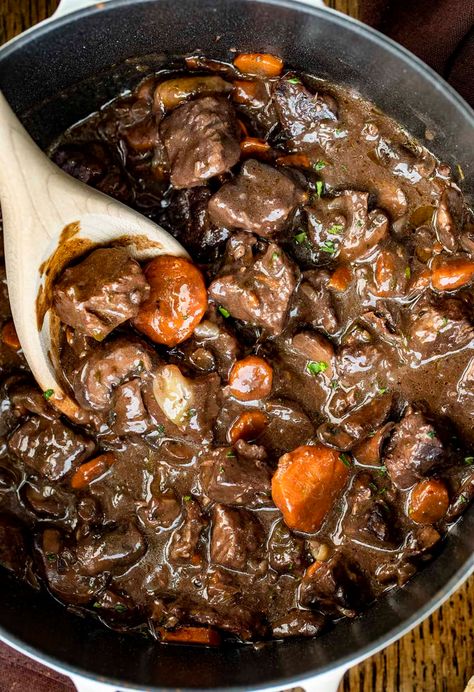 Beef Bourguignon, also known as Beef Burgundy, is tender beef that is simmered in a red wine gravy with lots of vegetables. Beef Burgundy, Beef Recipes, Soup Recipes, Comfort Food, One Pot Dinners, red wine in cooking, recipes, i am homesteader, iamhomesteader, Beef Burgundy, Wine Gravy, Red Wine Gravy, Pot Beef Stew, One Pot Dinners, Pot Roast Slow Cooker, Beef Chuck Roast, Beef Tips, Slow Cooker Recipes Healthy