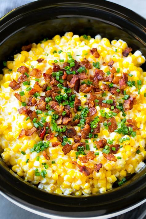 Slow Cooker Creamed Corn topped with bacon and chives. Slow Cooker Creamed Corn With Bacon, Slow Cooker Corn With Bacon, Healthy Crockpot Sides, Slow Cooker Pot Luck Dishes, Easter Slow Cooker Recipes, Crockpot Easter Recipes, Fall Pot Luck Ideas, Slow Cooker Vegetables, Cream Corn Crockpot