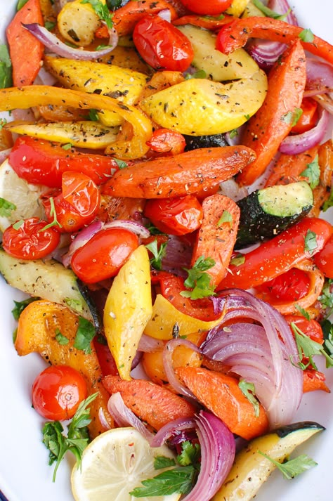 Mediterranean Roasted Vegetables are bursting with the sweet flavors that happen when you roast vegetables. The rainbow of vegetables are seasoned with oregano, thyme and a squeeze of lemon juice. These are the perfect vegan side dish to pair with grilled meats, add to a rice bowl or a healthy side dish. // acedarspoon.com #vegetables #vegan #roastedvegetables #mediterraneandiet Full Dinner Meals With Sides, Mediterranean Roasted Vegetables, Rainbow Veggies, Healthy Side Dish Recipes, Easy Mediterranean Diet, Roasted Vegetable Recipes, Easy Mediterranean Diet Recipes, Mediterranean Meals, Easy Side Dishes