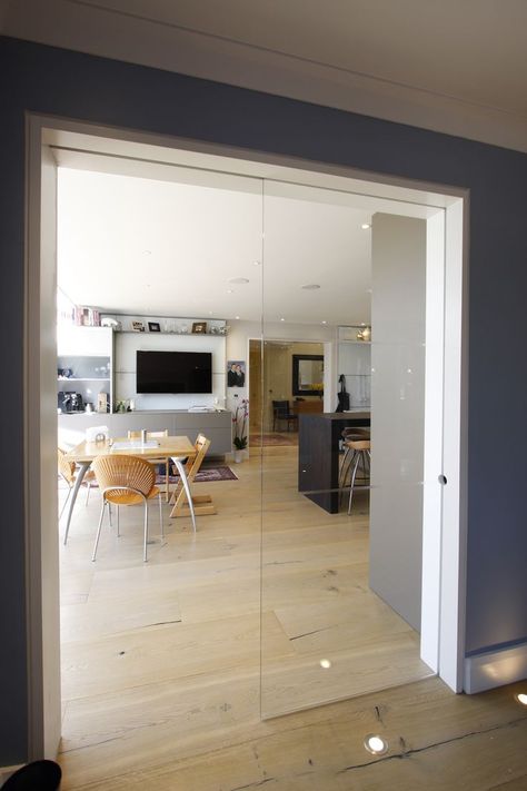 Frameless glass pocket doors to the kitchen from the hallway of London property Internal Glazing, Door Openings, Glass Conservatory, Glass Pocket Doors, Popular Interior Design, Sliding Pocket Doors, Open Plan Living Room, London Home, Pivot Doors