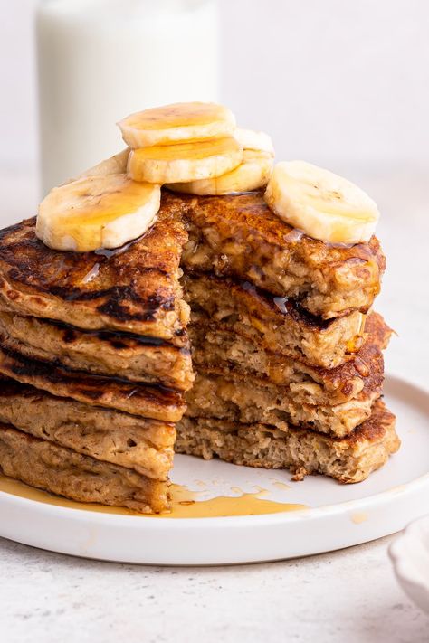 These healthy overnight oatmeal pancakes are hearty and packed with nutritious ingredients like rolled oats, whole wheat flour and Greek yogurt. They make for a quick and easy breakfast that the whole family will love! Healthy Overnight Oatmeal, Overnight Oatmeal Healthy, Homemade Almond Milk, Overnight Oatmeal, Oat Pancakes, Oatmeal Pancakes, Pastry Flour, Banana Slice, Cinnamon Banana