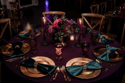 Jewel Tones Party, Moody Romantic Wedding Table Settings, Jewel Tone Party Decor, Vintage Jewel Tone Wedding, Emerald Green And Amethyst Wedding, Plum And Emerald Wedding, Emerald Green And Purple Wedding Decor, Jewel Tone Centerpieces Wedding, Moody Wedding Centerpieces Round Table