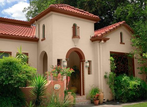 Hannah Applequist-Twichell - this is a gorgeous rich color Spanish ... Terracotta Painted House Exterior, House Paint Exterior With Red Roof, Spanish House Colors Exterior, Clay Color House Exterior, Red Stucco House Exterior, Terracotta Stucco Exterior, Salmon Exterior House Colors, Coral Exterior House Colors, Salmon House Exterior