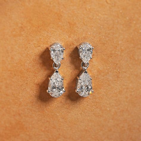 Double the sparkle, double the elegance ✨💎 These pear-shaped lab-grown diamond drop earrings are crafted to catch every light and turn every head. Embrace sustainable luxury with timeless beauty! #AuricCharms #beautybeyondmeasures . . . . . . . . . . #LabGrownDiamonds #DiamondEarrings #SustainableJewelry #EthicalLuxury #PearCutDiamonds #LuxuryEarrings #AuricCharms #EcoFriendlyJewels #FineJewelry #DiamondsWithPurpose #ShineBright #ElegantAccessories #SustainableBeauty #ConsciousJewelry #Jewelr... Luxury Earrings, Sustainable Jewelry, Elegant Accessories, Diamond Drop Earrings, Pear Cut, Shine Bright, Pear Shaped, Timeless Beauty, Lab Grown