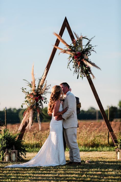 Triangle Arches For Weddings, Triangle Arbour Flowers, Wedding Arbour Triangle, Simple Rustic Wedding Arch, Mountain Wedding Alter, Nancarrow Farm Wedding, Wedding Arch Ideas Triangle, Triangle Altar Wedding, Unique Wedding Arch Ideas Outdoor