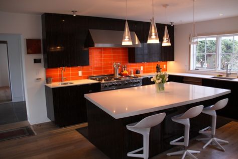 black and orange kitchens | Black Palm Kitchen, Orange Glass Tile, White Quartz CountersClick To ... Modern Kitchen Quartz Countertops, Yellow Kitchen Inspiration, Pig Kitchen Decor, Orange Kitchen Decor, Modern Kitchen Backsplash, Apple Kitchen Decor, Quartz Kitchen Countertops, Kitchen Backsplash Designs, Orange Kitchen