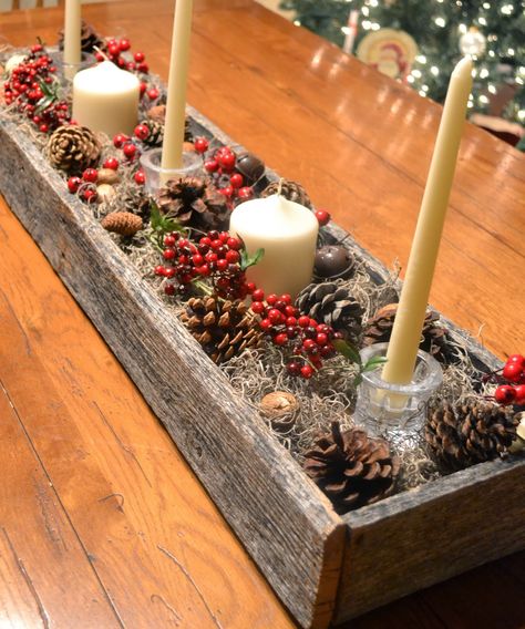 You remember that box my husband made from an old pallet?  Well, I removed the punkin’s and added more pine cones, berries, bells, and candles. Now, our table is ready for Christmas!  Yay!       Sorry about the photo “overkill”….I finally got a new camera, and I’m trying to figure out how to run Natal Country, Jul Diy, Christmas Table Centerpieces, Christmas Centerpieces Diy, Noel Christmas, Christmas Centerpieces, Country Christmas, Christmas Table Decorations, Christmas Deco