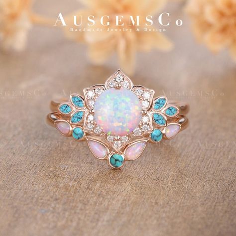 🌸One of a Kind - No Opal is the same, get your unique fine jewelry from AUSGEMSCo. **All rings are handmade and shipped in Australia. Pictures and video showing a Lab Opal & Moissanite ring. 🌸ITEM Details Engagement Ring Main Stone: Lab Opal, 6.5mm, Round Cut Accent Stone 1: Moissanite, DEF Color, VVS-VS Clarity, 0.1 ct total Accent Stone 2: Natural Turquoise, Marquise Cut, 3*1.5mm Ring Band: 1.6mm  Wedding Band: Main Stone 1: Natural Opal, Pear Cut Size: 1.5mm Main Stone 2: Natural Turquoise, Opal Turquoise Ring, Opal And Peridot Ring, Blue Opal Engagement Ring, Cottagecore Engagement Ring, Turquoise Engagement Ring, Australia Pictures, 6mm Wedding Band, Vintage Opal Engagement Ring, Opal Engagement Ring Set