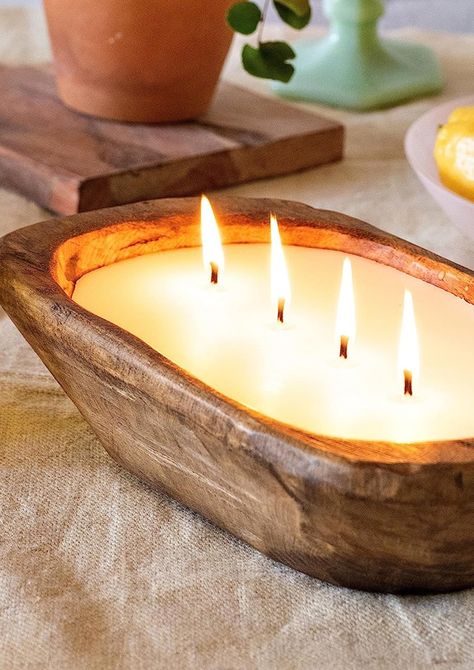 Add rustic charm to your table with our Wooden Dough Bowl Soy Candle. These farmhouse-inspired dough bowl candles create the perfect ambiance. 🕯️🌾 #WoodenDoughBowl #FarmhouseDecor #TableCenterpiece #SoyCandle #HomeAmbiance #HomeDeco Candle Holder Aesthetic, Wooden Bowl Candle, Wood Bowl Candle, Beach Theme Candles, Dough Bowl Candles, Brown Farmhouse, Hand Carved Wooden Bowls, Candle Bowl, Cozy Candle