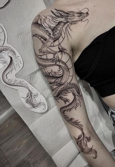 Dragon Arm Tattoo Wrap, Women Upper Arm Tattoo Ideas, Dragon Upper Arm Tattoo, Dragon Arm Tattoo Women, Dragon Tattoos On Arm, Dragon Tattoo Bicep, Dragon Wrapped Around Leg Tattoo, Tattoo Ideas Female Dragon, Tattoo Sleeve Dragon