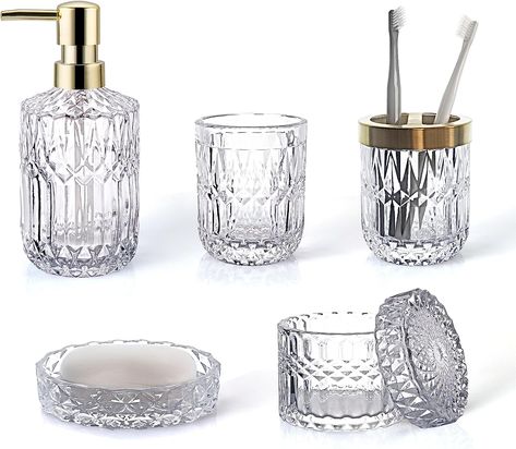 Glass 【Practical 5pcs Set Includes】 1 Soap Dispenser, 1Tumbler, 1Soap Dish, 1Toothbrush Holder, 1 Jar for cotton swab or cotton pads 【Multifunctional】 5pcs Crystal Clear Glass Bathroom Accessories will keep your bathroom tidy and organized. You can use these items together in your bathroom counter, your restroom, or you can use individual piece, such as tumbler for makeup tools, razor or pens, dispenser for lotion, soap and more. It is also a stylish decoration full of vitality for your monotono Crystal Bathroom Accessories, White Bathroom Accessories Set, Black Bathroom Accessories Set, Glass Bathroom Accessories, Crystal Bathroom, Vintage Bathroom Decor, White Bathroom Accessories, Bathroom Accessories Set, Perfect Bathroom