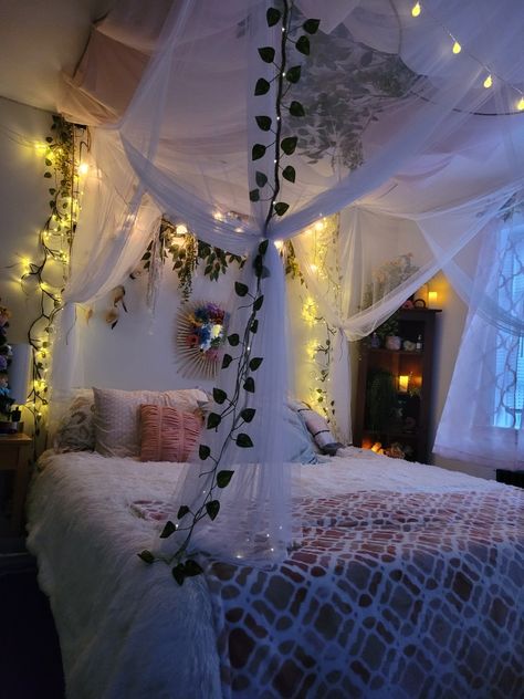 Over Bed Hanging Canopies, Bed With Hanging Canopy, Bed Canopy Decorations, Hanging Bed For Bedroom, Canopies Over Bed, Bed Canopy Aesthetic Bedroom, Fake Branches Decor, Canopy Bed Vines And Lights, Aesthetic Bedroom Ideas Canopy Bed