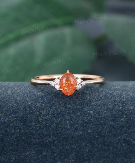 Oval cut Sunstone Engagement ring Unique rose gold Moissanite ring Diamond ring simple ring Bridal ring Pomise ring Anniversary ring -----Ring Information----- +Center stone: 4*6mm Sunstone +Cut type: Oval cut  +Side Stone:  Natural Diamonds or Moissanite Approx weight: 0.06ctw Metal : Solid 14k/18k yellow gold white gold or rose gold, other metal or gemstones, please contact me! Click on the "Pin It" icon if you like this item, Thanks so much! Ring Size All rings are standard CA/US size, 3-9US can be selected from the drop-down menu. If want other ring size, please contact me, and I can make it for you. Processing Time  Most of rings will take 2-3 weeks to make. I am  glad to accept any rush orders, please contact me for more details. Returns & Exchanges & Cancel We offer a 30-day return Sunstone Engagement Ring, Diamond Ring Simple, Rose Gold Moissanite Ring, Gold Moissanite Ring, Unique Roses, Engagement Ring Unique, Full Eternity Ring, Simple Ring, Curved Wedding Band