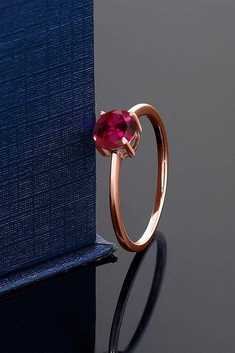 This ring features a 10K rose gold princess cut red ruby in the middle of a 6x6mm round heat-treated red ruby. The total weight of the ring is 1 cttw. #women #rosegold #engagement_ring Rose Gold Ring Simple, Pretty Engagement Rings, Rose Gold Engagement Ring Vintage, Engagement Ring For Women, Ruby Rose, Red Ruby, Vintage Rose, Gem Stone, Rings Simple