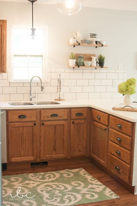 Refinished Oak Kitchen Cabinets, White Walls Wood Cabinets Kitchen, 90s Wood Kitchen Cabinets, Wood Cabinet Hardware Kitchen, Tudor Brown Briwax On Oak Cabinets, Counter Tops For Oak Kitchen Cabinets, Diy Fretwork, Backsplash Size, 90s Kitchen