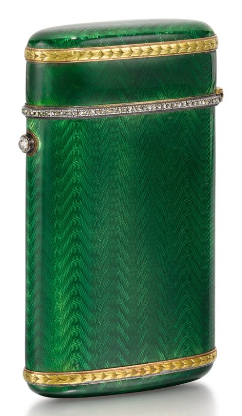 LIVE AUCTION STARTS 26. NOVEMBER 2919  ST PETERSBURG, 1899-1908 enamelled in wavy emerald-green, the flange mounted with a row of rose-cut diamonds, diamond-set pushpiece, the upper and lower borders with chased husk leaf mounts in green and red gold, struck inside the lid and body with workmaster's initials and Fabergé in Cyrillic, with later import marks height 7.8cm, 3⅛in Faberge Eggs, Art Storage, Blue Colour Palette, Scent Bottle, Printing Business, Green And Red, Diamond Set, Jewelry Business, Works Of Art