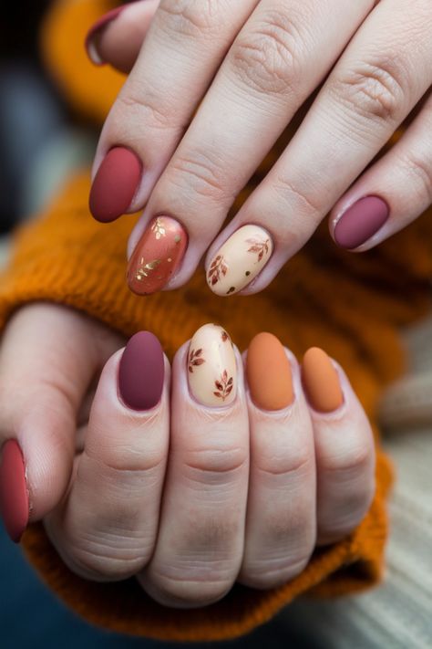 Embrace the spirit of autumn with these cozy round fall nail ideas that capture the essence of the season. Picture rich burgundy and earthy tones styled in a perfect round shape, reminiscent of falling leaves. Add subtle gold accents for a touch of elegance, making your nails the ideal accessory for chilly days. These designs not only reflect fall鈥檚 warm hues but also ensure a chic statement wherever you go. Get inspired and show off your autumn flair! Fall Round Nails, Autumn Leaf Nails, Mood Nails, Leaf Nails, Fall Thanksgiving Nails, Autumn Florals, Nails Autumn, Fall Nail Ideas, Sweater Nails