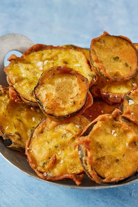 Beguni are a deliciously simple Bangladeshi fritter associated with monsoon season in the country. This recipe allows you to create the fried aubergine slices at home, made extra-crisp thanks to rice flour and spiced with cumin, chilli and turmeric. For more authentic Bangladeshi recipes, take a look at Dina's other recipes here. Fried Aubergine Recipe, Bangladeshi Breakfast, Beguni Recipe, Aubergine Fritters, Bangladesh Recipes, How To Freeze Asparagus, Fried Aubergine, Freezing Asparagus, Bangladeshi Recipes