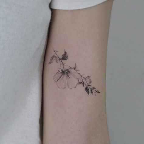 Magnolia flower tattoo by Tattooist Flower #TattooistFlower #flowertattoos #koreanartist #fineline #linework #realism #realistic #simple #minimal #small #flower #magnolia #leaves #nature #tattoooftheday Magnolia Flower Tattoo, Tiny Tattoos With Meaning, Simple Flower Tattoo, Magnolia Tattoo, Tattoo Nature, Stylish Tattoo, Small Tattoos With Meaning, Small Flower Tattoos, Tattoo Desings