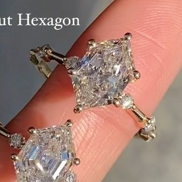 Golden String Inc on Instagram: "Finally the comparison you’ve been waiting for🤩 2.5ct Hexagon Diamonds but Step cut vs Brilliant cut! Our Step cut hexagon is our Original, Clean, Geometric Facetted Diamond! And our Brilliant cut hexagon is our Modern, Shiny, Mixed Facetted Diamond! •2.5ct Elongated Hexagon on our Spaced Diamond Band (Step Cut vs Brilliant Cut) The rings on our feed are custom therefore aren’t listed on our website! The best way to order is through DM, Email, or Phone. Available in Lab Diamond -Please Message All Price Inquiries✨ #hexagoncut #hexagoncutdiamond #hexagondiamond #hexagonengagementring #emeralddiamond #emeraldcutengagementring #2caratdiamond #2carat #radiantcutdiamond #emeraldcutring #losangeles #engagementring #radiantsolitaire #yellowgoldradiant #labd Spaced Diamond Band, Hexagon Engagement Ring, Hexagon Diamond, Emerald Cut Rings, Emerald Engagement Ring Cut, Radiant Cut Diamond, Step Cut, Diamond Band, Emerald Diamond