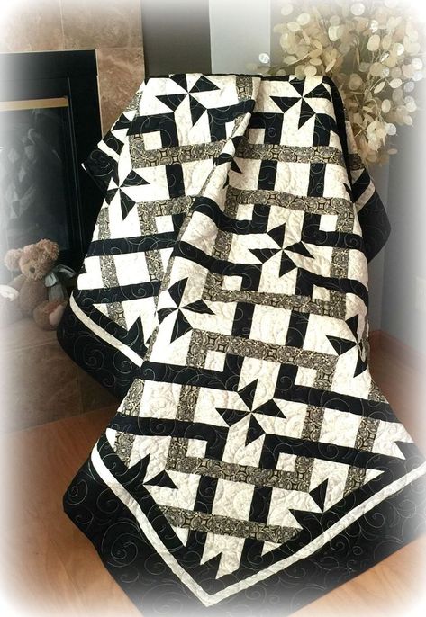 #451 Simply Stunning Quilt Pattern Looks more difficult then it is. Pinwheels can be added or omitted. Black And White Quilt, Black And White Quilts, Basic Quilt, Quilt Modernen, Quilting Frames, Pinwheel Quilt, Jellyroll Quilts, Easy Quilt Patterns, Pdf Quilt Pattern