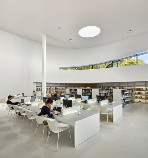 Library by Dominique Coulon & Associés features "unfurling ribbon" facade E Library Design, Traditional Home Offices, Library Cafe, Library Architecture, Third Place, Home Library Design, Library Design, Urban Spaces, Desk Design