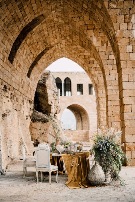 Hello, luxury! This gorgeous wedding in Lebanon had an intimate wedding in the middle of the sea and a luxe reception with velvet linens in mustard and royal blue hues with the prettiest details you've ever seen. This destination wedding is a must-see! Lebanon Wedding, Enchanted Garden Wedding, Styled Photoshoot, Orange Tulips, Micro Weddings, Gold Vases, Patterned Plates, Brown Wedding, Private Wedding