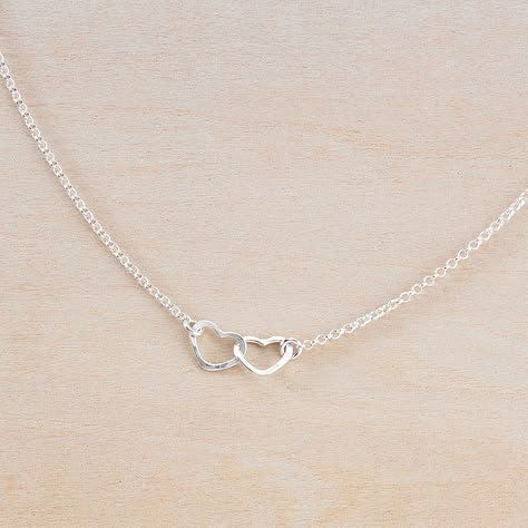 Online exclusive! These tiny linked hearts are the happy focus of this adorable necklace! Two sterling silver hearts are hammered and linked together - each heart is about 1/4" wide. Necklace Details all components made of sterling silver choose from 16" and 18" chains hand formed and hammered in Nashville, TN. Tiny Heart Necklace, Silver Jewlery, Silver Necklace Simple, Hammered Jewelry, Pretty Jewelry Necklaces, Hearts Necklace, Necklace For Girlfriend, Jewelry Accessories Ideas, Silver Jewelry Necklace