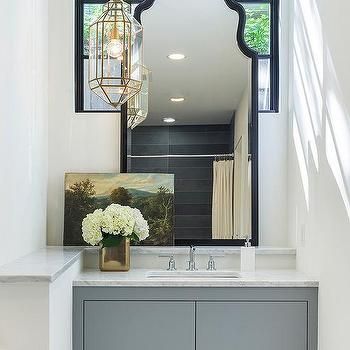 Bathroom Vanity in Front of Window - Contemporary - bathroom - Veranda Sleek Bathroom Design, Gold Oval Mirror, Bathroom Dressing Table, Black Arch Mirror, Tile Shower Niche, Glass Shower Wall, Chic Cabin, Blue Laundry Rooms, Black Arch