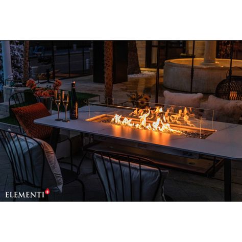 DescriptionThe Elementi Plus Oslo 70" Rectangular Marble Porcelain Gas Fire Table is meticulously crafted with a combination of marble porcelain and sturdy metal, creating a visually stunning focal point in any setting. The 30-inch burner, constructed from durable 16-gauge 304 stainless steel, ensures not only longevity but also efficient and even heat distribution.The accompanying burner pan, crafted with the same high-quality stainless steel, measures 42.6 × 12.6 × 2.6 inches, providing the perfect canvas for a captivating fire display. Ignite the flames effortlessly with the push-button spark ignition system, offering a maximum heat output of 60,000 BTUs for CSA certification or 16 KW for CE & UKCA compliance.Whether you opt for natural gas or propane, this fire pit seamlessly combines Patio Table With Fire Pit, Table With Fire Pit, Modern Fire Pit, Modern Flames, Rectangular Fire Pit, Gas Fire Table, Patio Fireplace, Fire Pit Bowl, Fire Pit Accessories