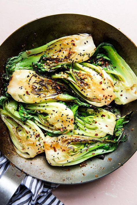 In this ready-in-a-flash baby bok choy recipe, the tiny cruciferous bulbs are sautéed until just-done in nutty sesame oil, and finished with fresh garlic, a dash of soy sauce and red pepper flakes. Buck Choy, Choy Recipes, Meal Starters, Traditional Asian Dish, Spring Harvest, Modern Proper, Mapo Tofu, Bulgogi, Vegetable Sides