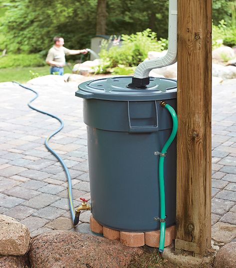 Save Water With This DIY Rain Barrel: Looking for your next garden project? We have the full instructions for a DIY rain barrel out of a heavy-duty trash can. Rain Barrel Ideas, Rain Water Barrel, Diy Rain Barrel, Rain Barrel Stand, Rain Barrel System, Barrels Diy, Water Collection System, Barrel Ideas, Rain Harvesting