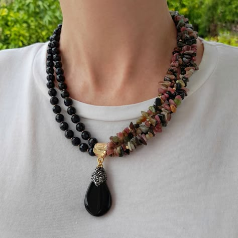 Rainbow tourmaline raw crystal and onyx layered necklace. Chunky statement gemstone beaded necklace for women. Large rainbow and black handmade necklace with big bead and gemstone. Big bold bohemian bright necklace in gold color are suitable for an casual look, evening look and for a holiday. These necklace will be a good christmas, anniversary, wedding or birthday gift for wife, girlfriend, sister or daughter. Women's necklace with natural stone. It emphasizes the beauty of your neck and adds c Diy Chunky Necklace, Chunky Crystal Necklace, Big Bead Necklace, Black Stone Necklace, Bold Bohemian, Rainbow Tourmaline, Raw Crystal Pendant, Bright Necklace, Layered Beaded Necklaces