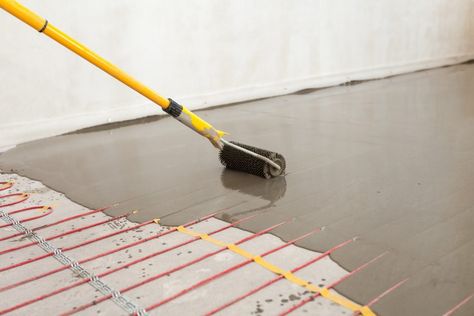 Pros and Cons of Heated Floors | StreetEasy Heated Concrete Floor, Floor Heater, Radiant Heating System, Heated Garage, Floor Heating Systems, Electric Underfloor Heating, Floor Heating, Radiant Floor Heating, Radiant Floor