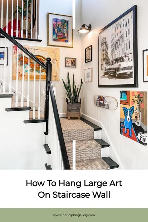 Create a stunning staircase wall with large art by following these expert tips—discover the secrets to achieving perfect placement! Large Art Staircase, Stairway Wall Art Ideas, Large Art In Stairwell, Picture Collage Wall Staircase, Art For Stairway Wall, Art On Staircase Wall, Stairway Artwork, Pictures On Staircase Wall, Staircase Feature Wall