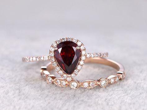 Garnet bridal ring set in BBBGEM,see our January birthstone wedding set in blue with round,oval,cushion,princess,emerald cut,pear shapes. Ruby Engagement Ring Set, Pear Shapes, Ruby Wedding Band, Rose Gold Art, Red Ring, Antique Engagement Ring, Amethyst And Diamond Ring, Ruby Engagement Ring, Rose Gold Wedding Bands