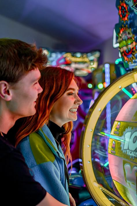 Themed Couple Photoshoot Ideas, Couple Photoshoot Theme Ideas, Arcade Family Photoshoot, Playroom Photoshoot, Gamer Engagement Photos, Arcade Prewedding, Arcade Couple Aesthetic, Arcade Couples Photoshoot, Board Game Photoshoot