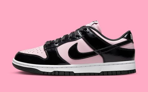 Nike has a brand-new drop of pink and black patent leather Dunk Lows planned for sometime in 2022, continuing a tradition that dates back to at least 2005. The pair appears simple at first sight, with its pink leather top and black overlays, both of which are traditional design choices; nevertheless, a closer look reveals that the overlay is made of crinkled patent leather. That famously crumpled patent, which first appeared on the “Shattered Backboard 3.0,” is indeed correct. Here, Black Pink Dunks, Pink And Black Sneakers, Pink And Black Dunks, Black And Pink Shoes, Pink And Black Shoes, Pink And Black Nikes, Dunk Lows, Pretty Sneakers, Crocs Fashion