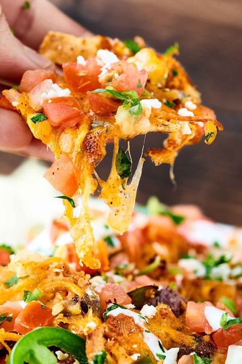 Loaded Chicken Nachos Recipe - Crockpot Chicken, Vegetables, & More! Loaded Chicken Nachos Recipe, Loaded Chicken Nachos, Shrimp Nachos, Steak Nachos, Chicken Beans, Beef Nachos, Steak Shrimp, Chicken Nachos Recipe, Loaded Chicken