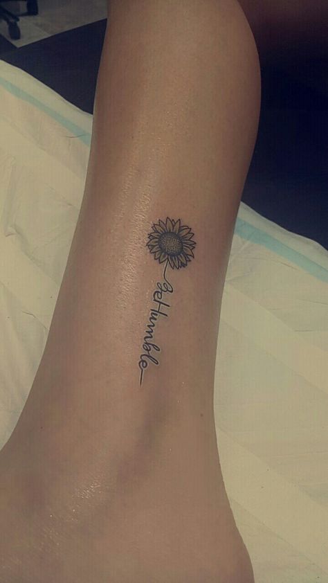 Sunflower tattoo, be humble tattoo writing Sunflower With Writing Tattoo, Humble Tattoo Design, Humble Tattoos For Women, Small Sunflower Tattoo With Quote, Small Sunflower Tattoo, Humble Tattoo, Sunflower Tattoo Simple, Sunflower Tattoo Shoulder, Sunflower Tattoo Sleeve