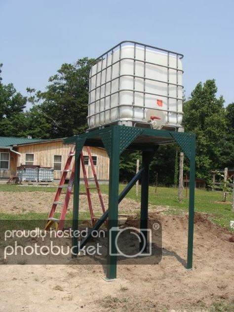 Dave's Discourse: finished the water tank stand! Farm Water Tank, Water Tank Stand Design, Water Tank Stand, Water Collection System, Steel Water Tanks, Tank Stand, Water Storage Tanks, Storage Tanks, Water Collection